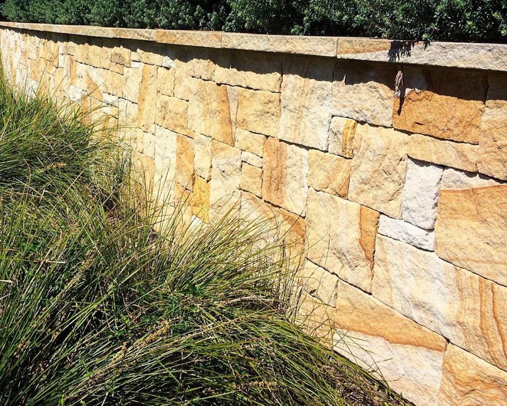 Aussietecture banded colonial sandstone seen in a landscaping project as wall claddings