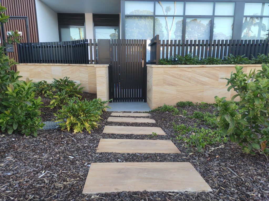 Sandstone tiles and pavers in garden design