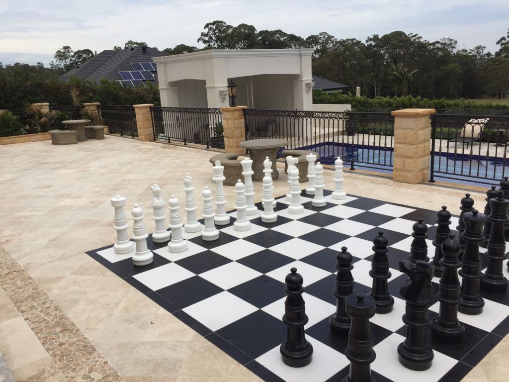 Outdoor entertaining spaces with Travertine paver and rockface sandstone