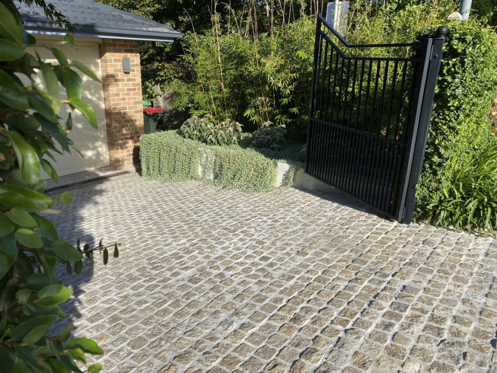 Tiger Rust Cobble Stone Paver seen in driveway floors
