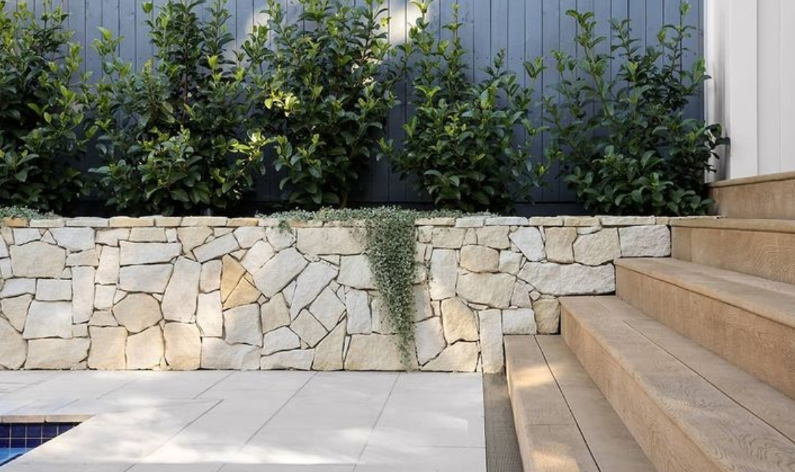 Outdoor design with stone. Banded irregular Australian sandstone cladding.