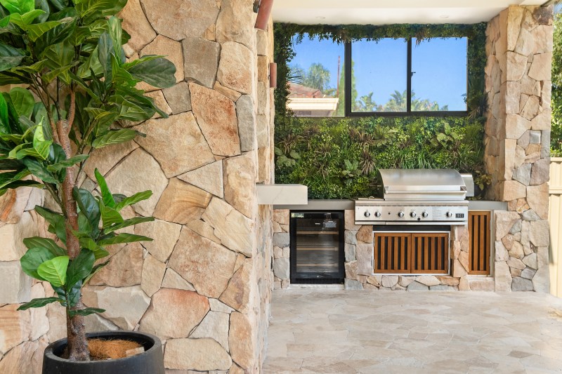 Berwick Irregular walling and Classic travertine crazy paving.