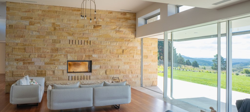 Aussie Gold sandstone fireplace featured wall in Mittagong
